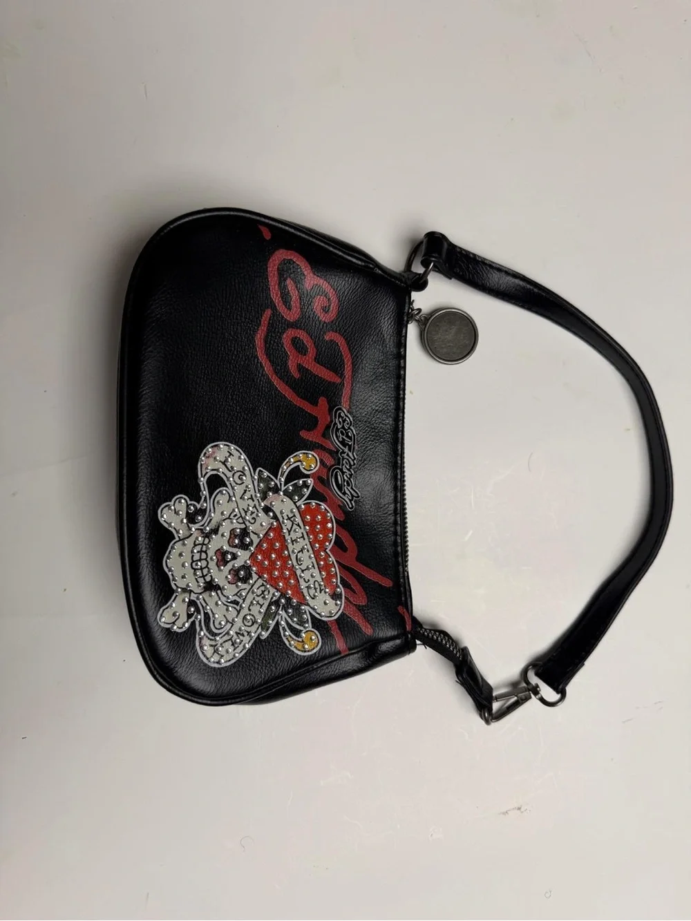 Es hardy Black Wristlet Bag with Embellished Heart Design